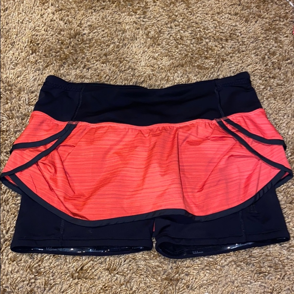 Coral and black lululemon skirt
